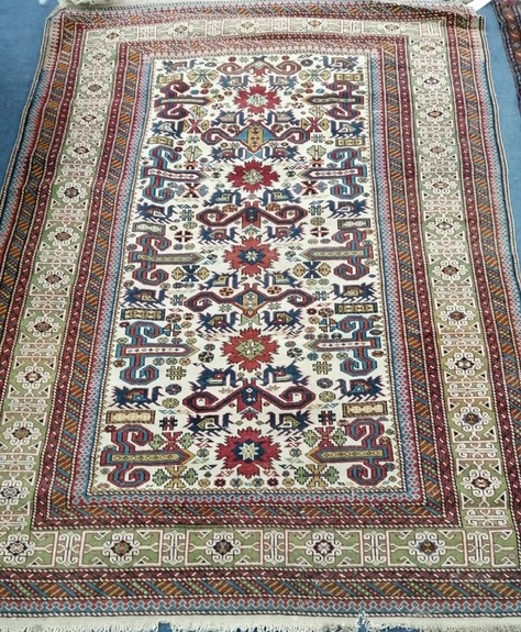 A Shirvan ivory ground rug 130 x 180cm